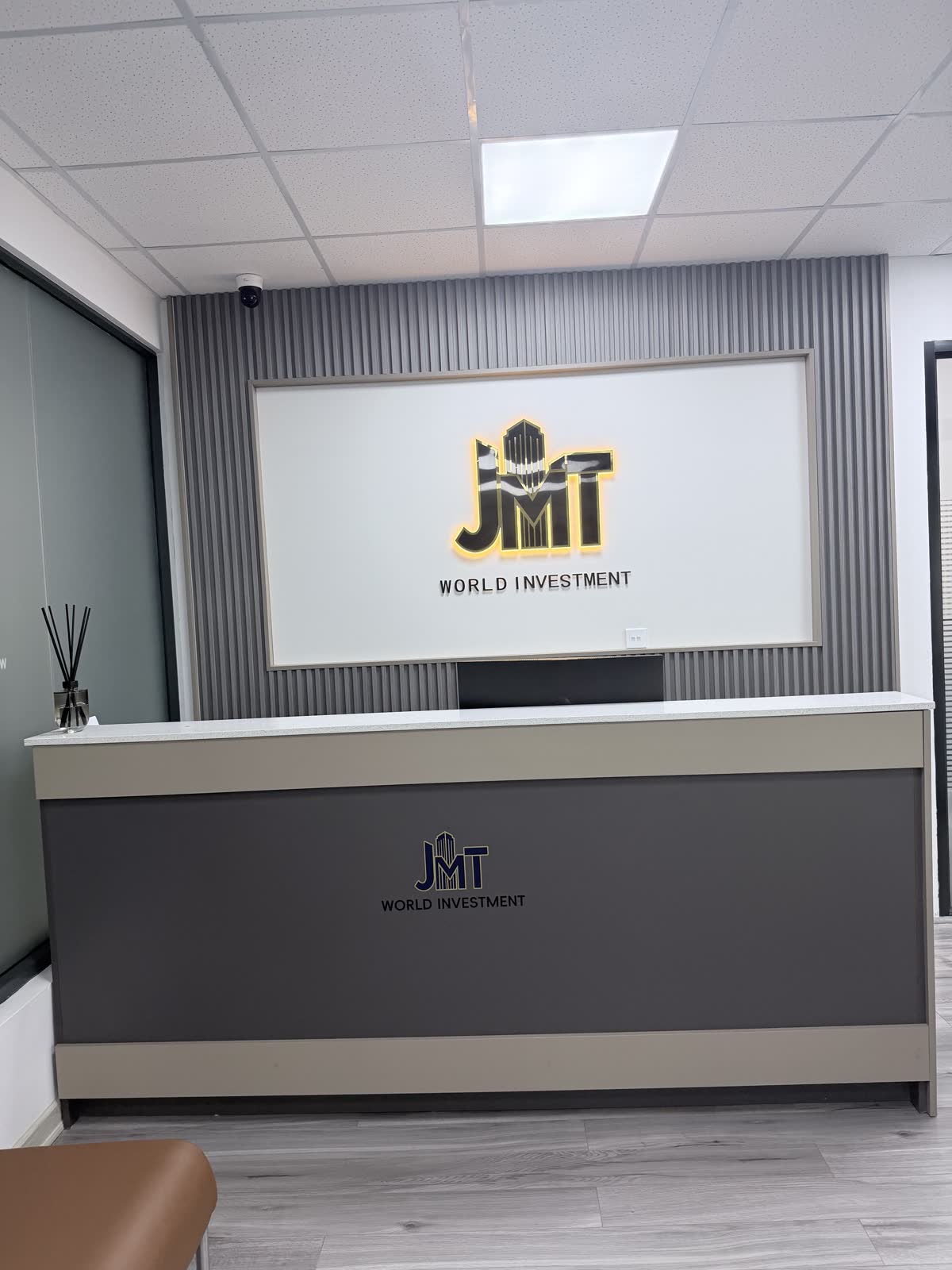Reception desk with JMT logo